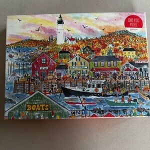 1000 piece “Autumn by the Sea” jigsaw puzzle by Galison